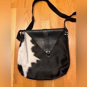 Handmade black and white cow hide crossbody